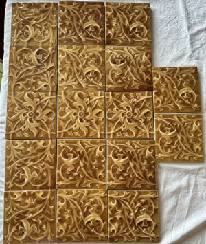 Antique AETCO Floral Fireplace Tiles — Honey-Amber Relief, 17-Tile Surround